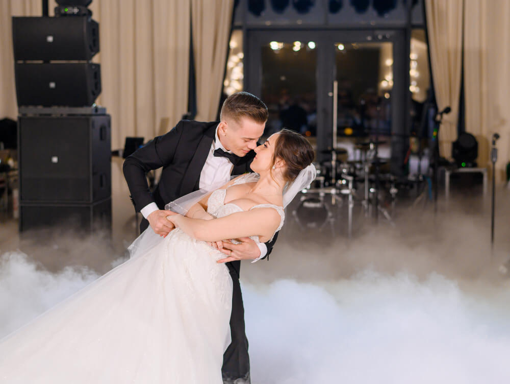 Couple practicing their first dance for wedding in Cardiff